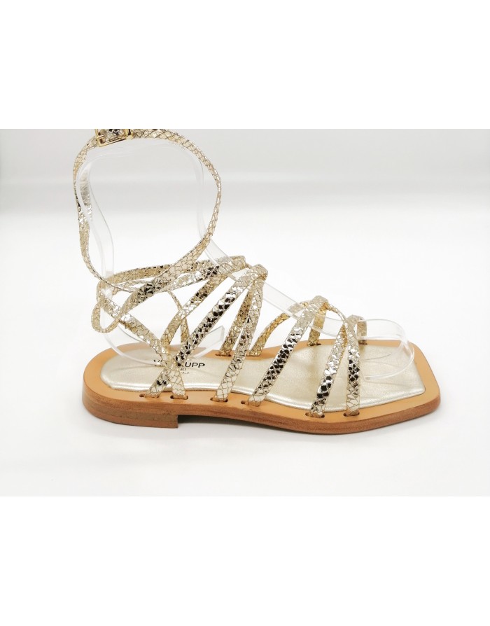 VIA KRUPP 22, SANDALO ALLA SCHIAVA IN PITONE LAMINATO COLORE PLATINO, FONDO CUOIO